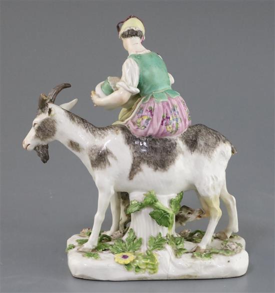 A Meissen group of the Tailors wife, c.1750, height 17.5cm, some losses